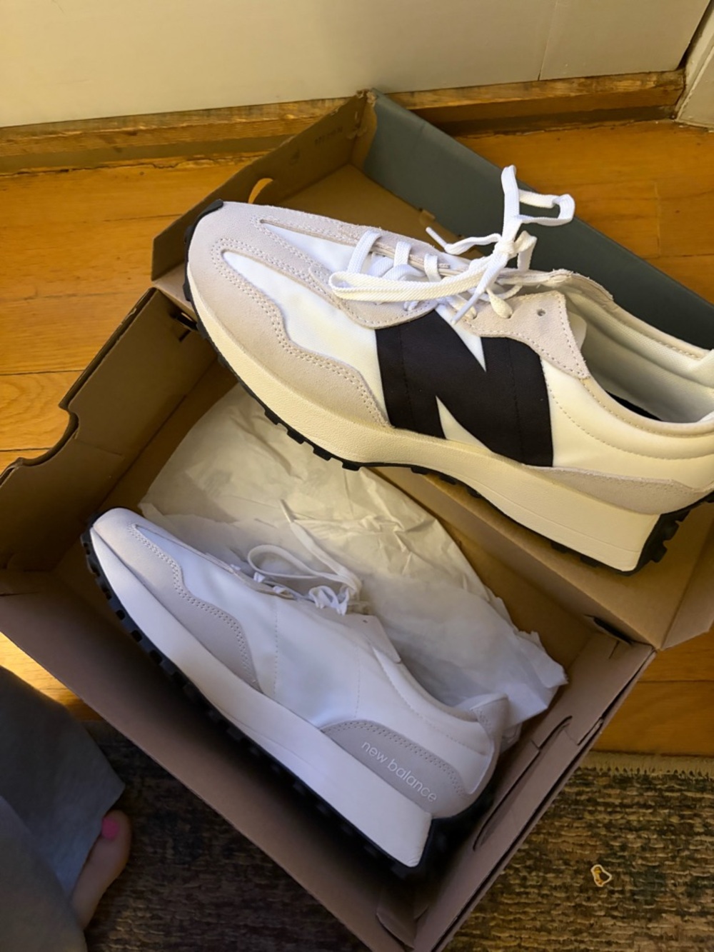 New Balance women’s White and Black 327 Sneakers